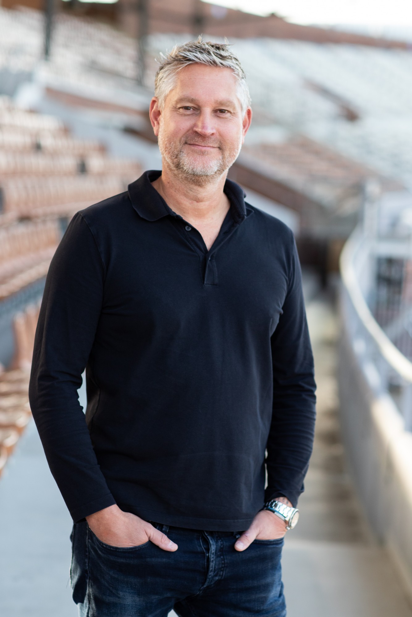 David Dwinger smiling in a stadium